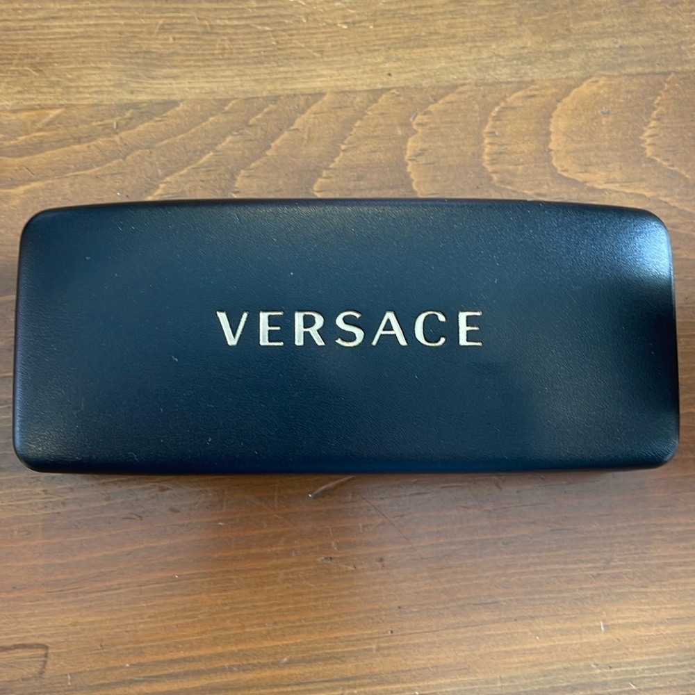 Versace glasses/sunglasses case. Comes with microfiber cloth.